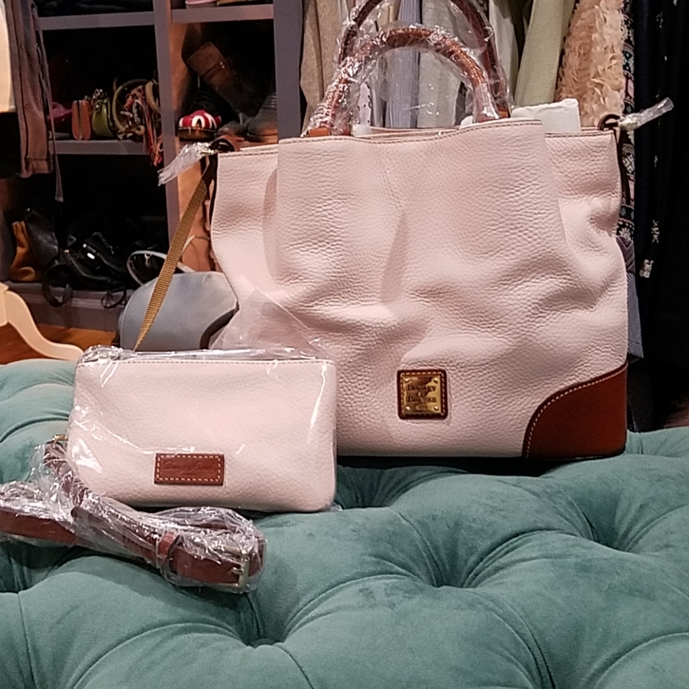Large Dooney & Burke leather bag, shoulder straps and small leather bag.